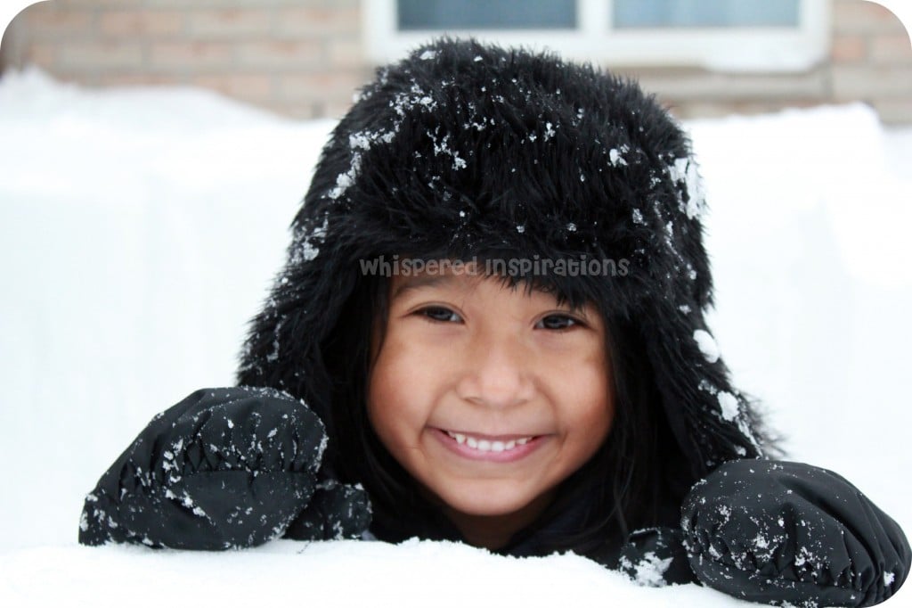 Snowmageddon. A little girl plays in the snow!