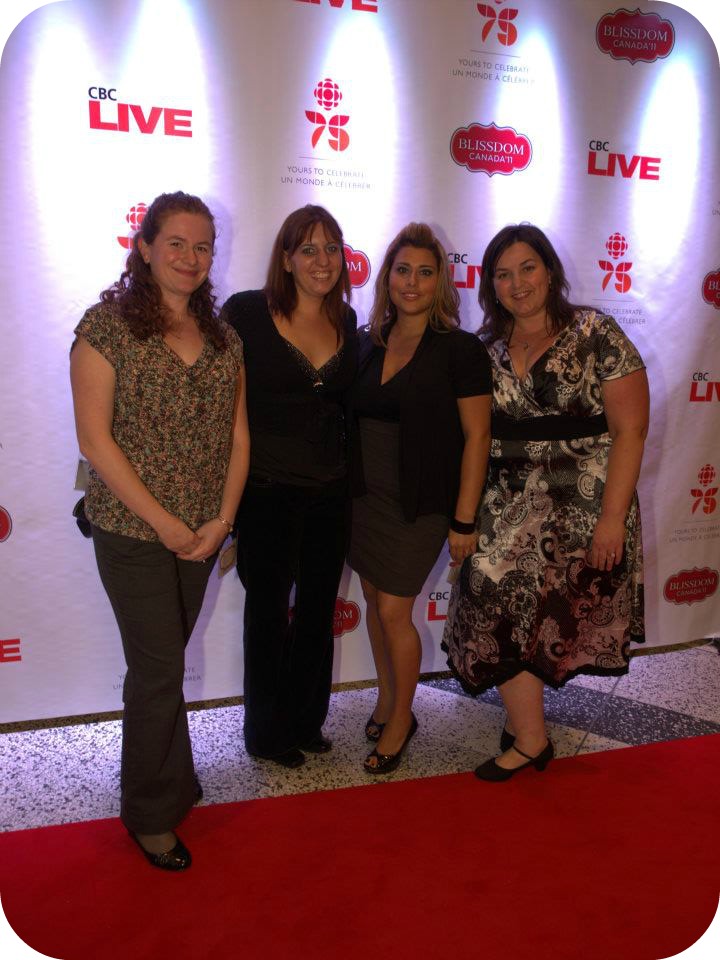 A group of women post in front of the CBC Live sign.