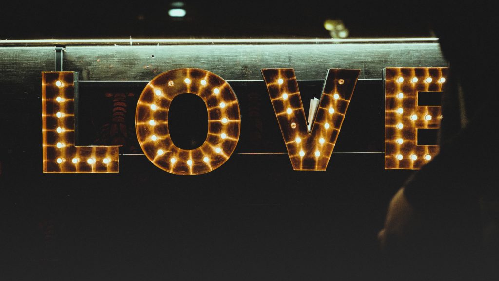 A light marquee with the word love.