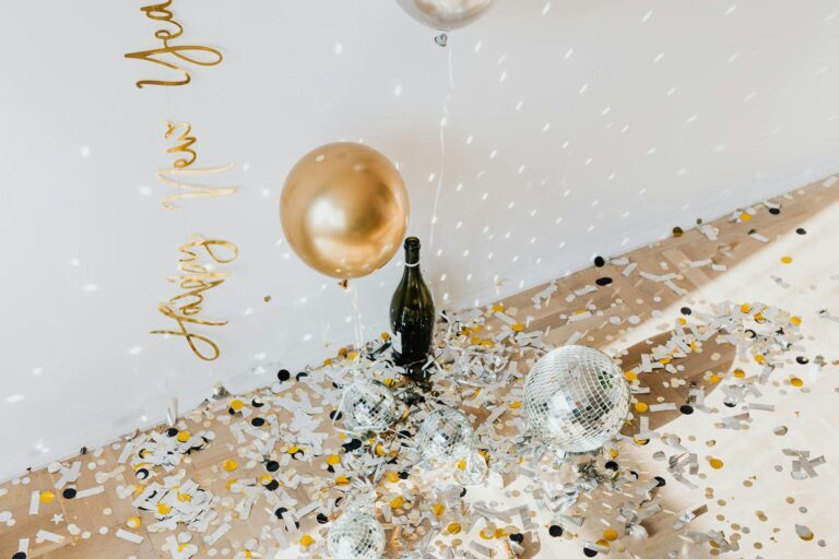 Photo of confetti near disco balls. This article is wishing you all a blessed & Happy New Year!