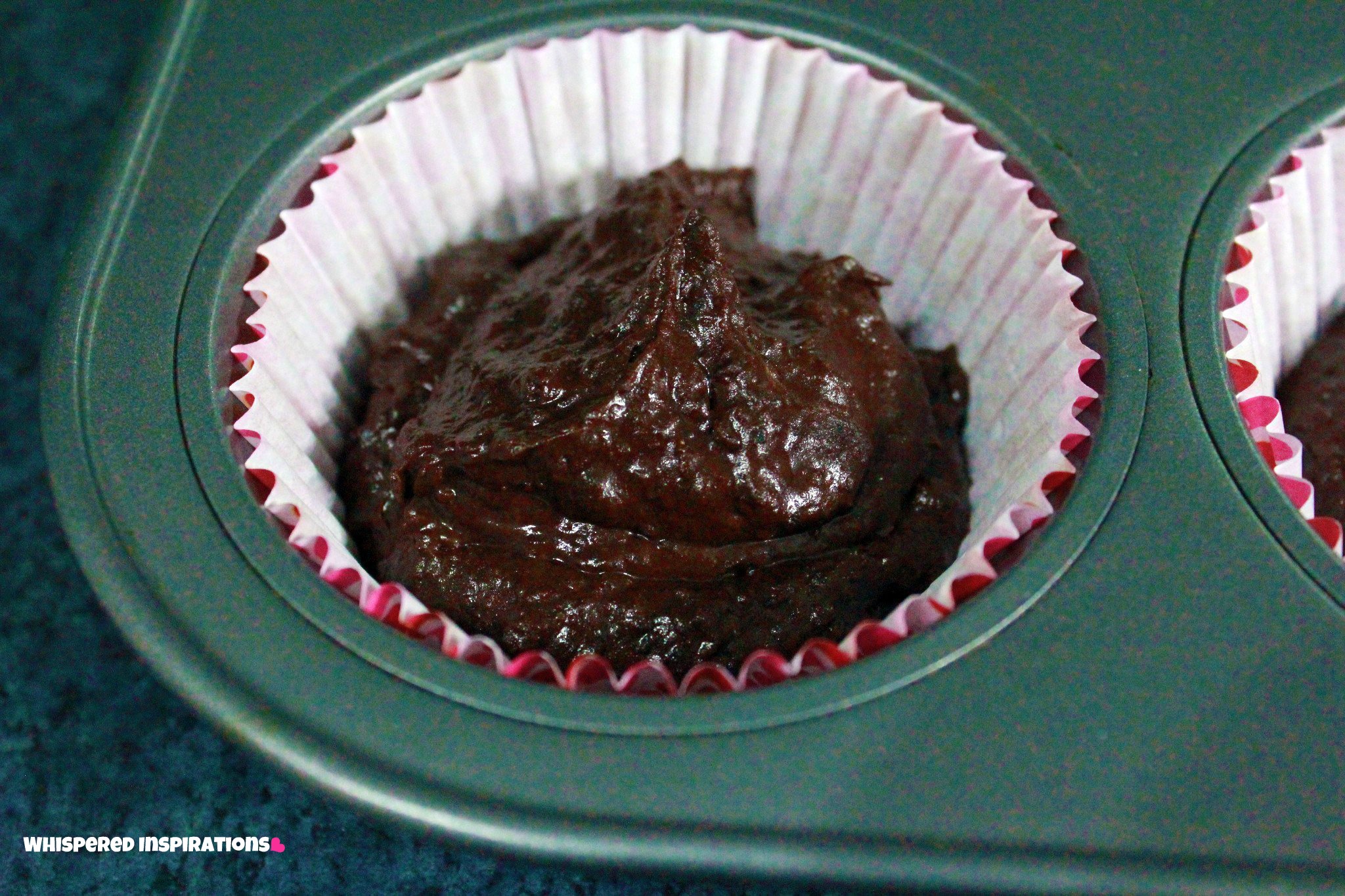 A close up of a cupcake liner in tray.