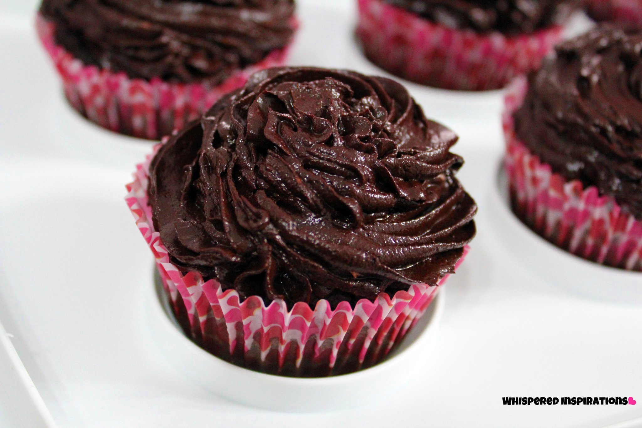 A close-up of an organic and gluten-free chocolate cupcake.