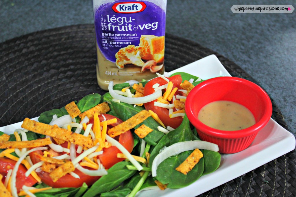 NEW Kraft Pourables in Garlic Parmesan is on the side for a skinny spinach salad.