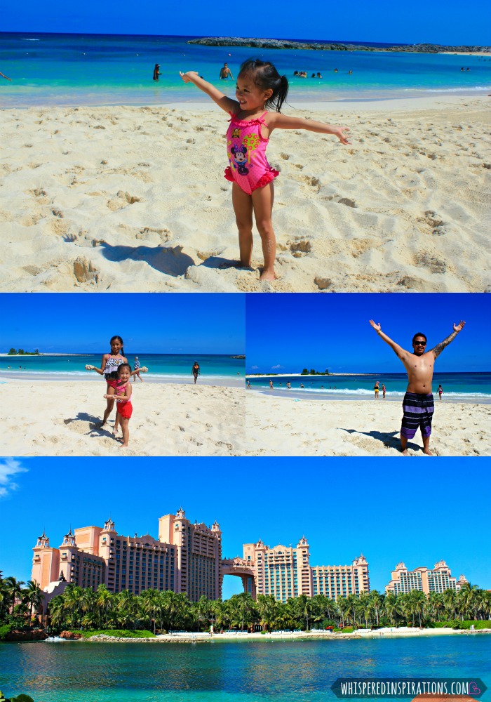 The girls and their dad enjoy the beach at Atlantis. 