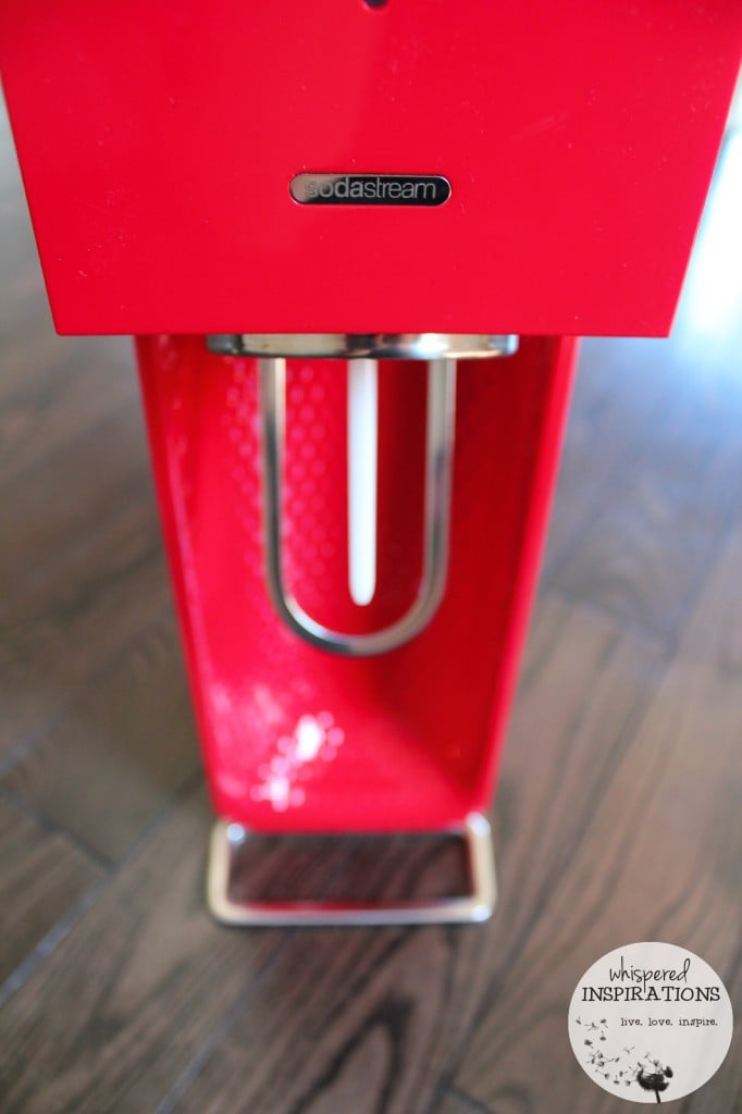 Red SodaStream machine. 