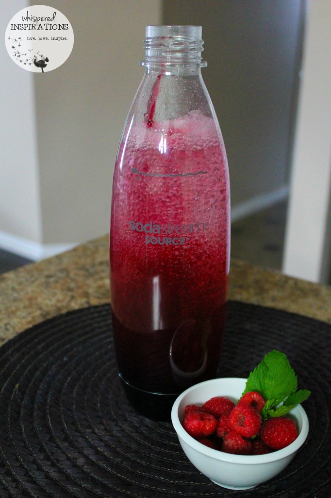Cranberry syrup is added to SodaStream bubbles. 