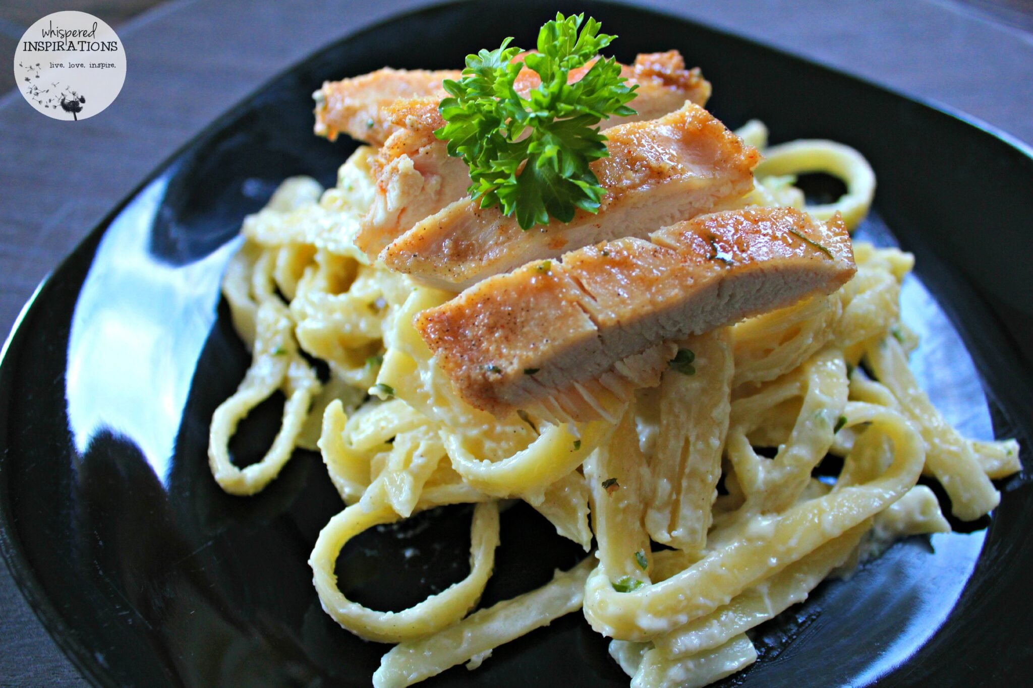 Fettucine alfredo with chicken and fresh herbs. This article has the Kids Chicken Fettuccine Alfredo Recipe.