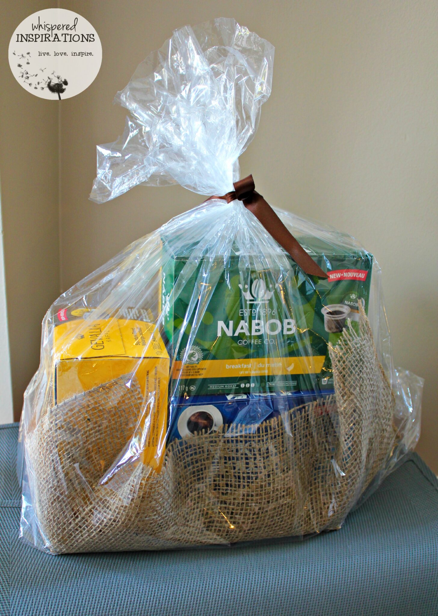 A gift basket with K-cups from Nabob, Gevalia, and Maxwell House.