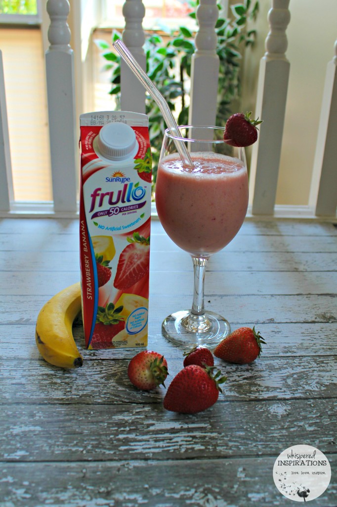 A carton of SunRype frullo with fresh banana and strawberries and smoothie.