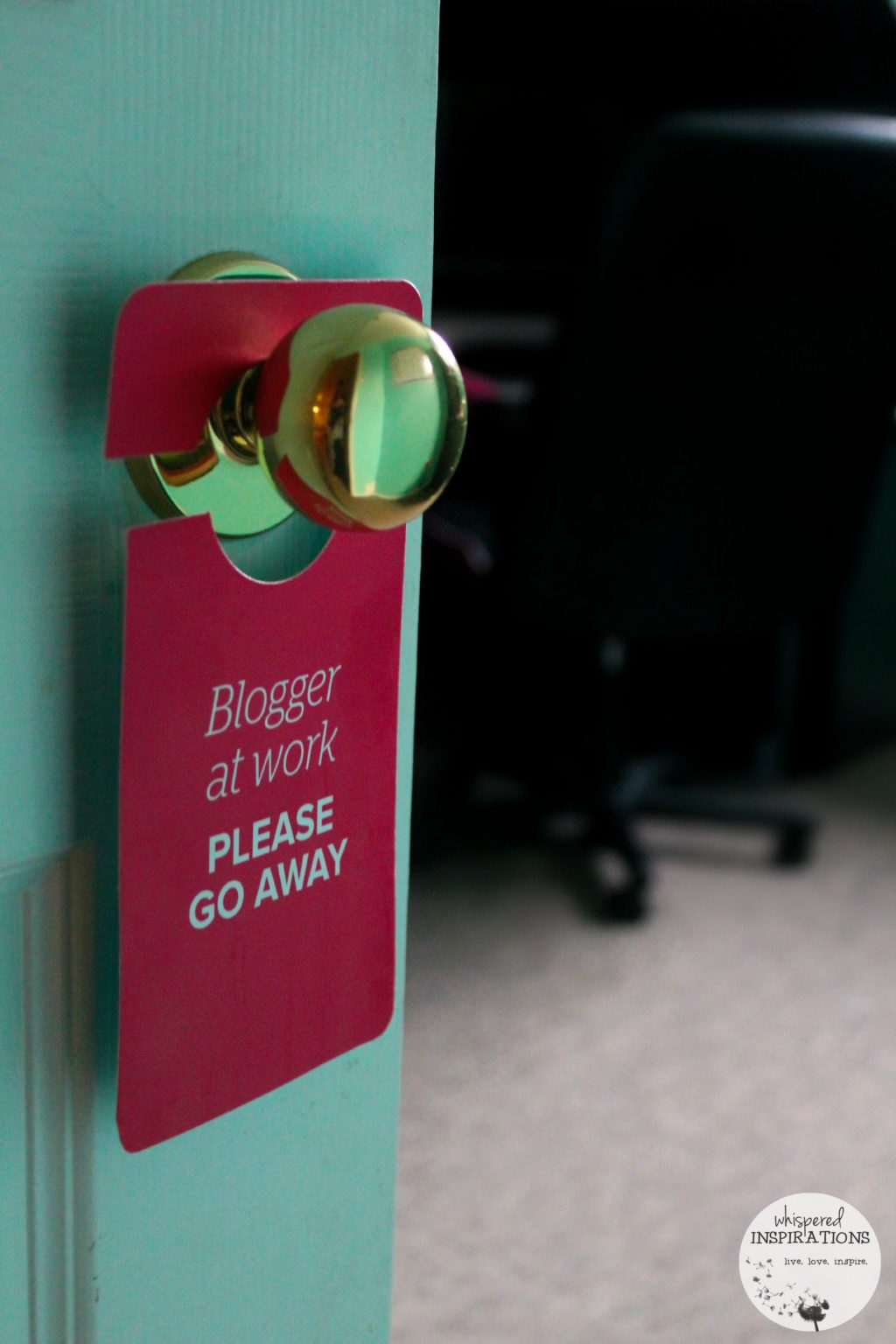 Blogger at work sign hanging on the door.