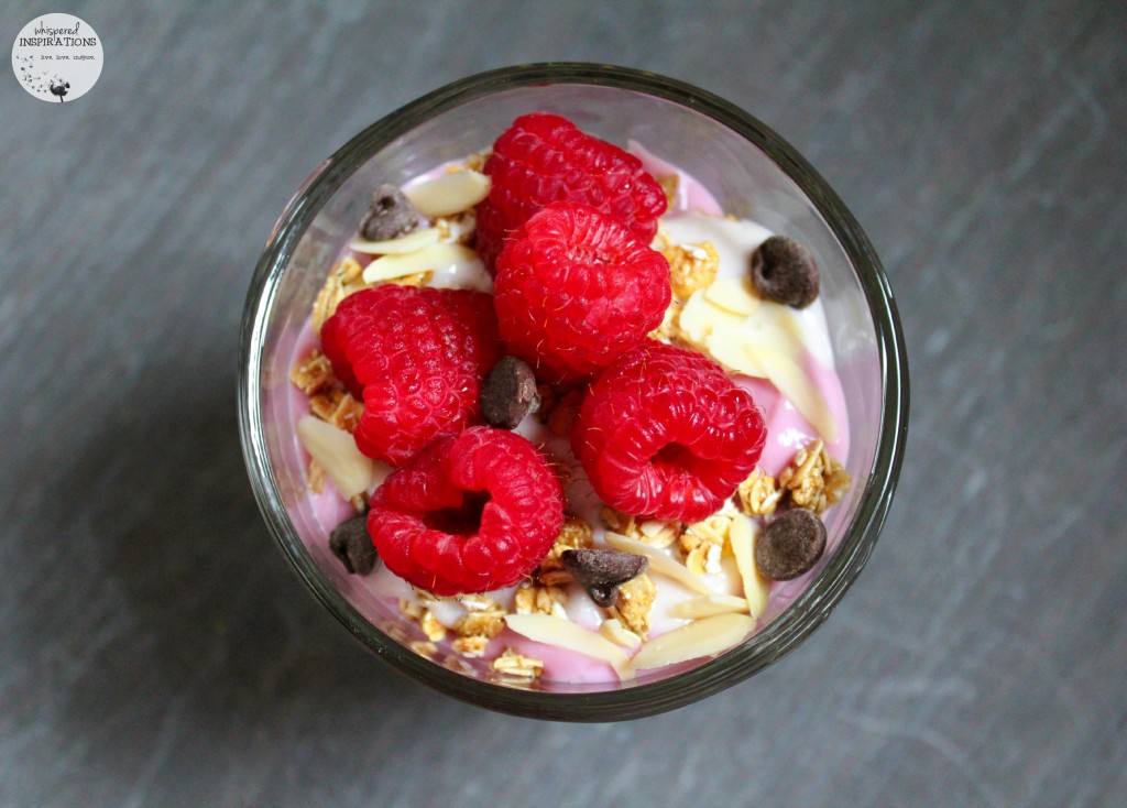 The top view of a raspberry yogurt parfait made with Special K.