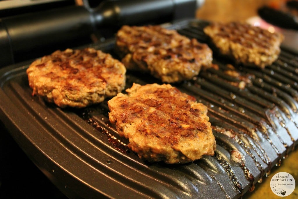 Beef burgers grilling on the T-fal Optigrill. 