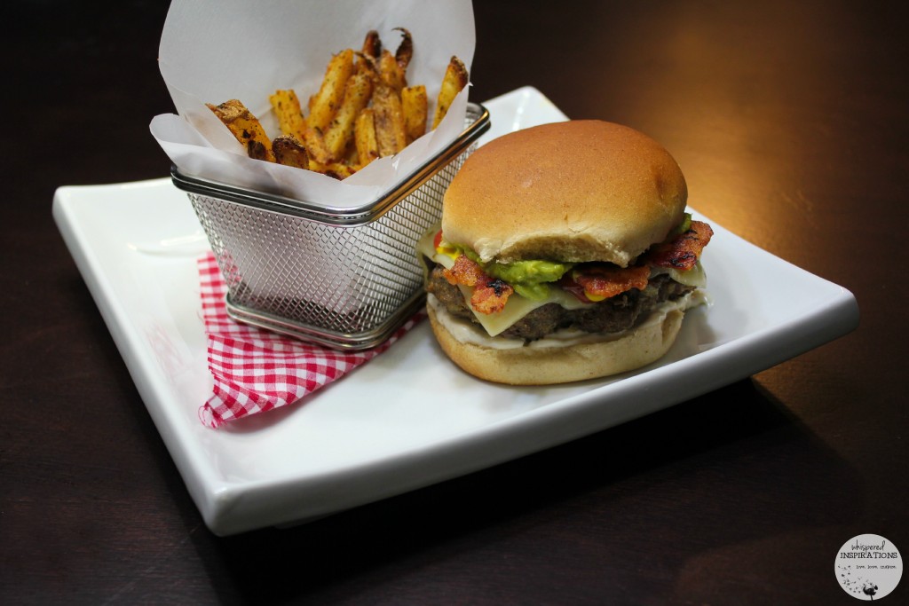 Pepper Jack Bacon Guacamole Burger with french fries made with an air fryer.