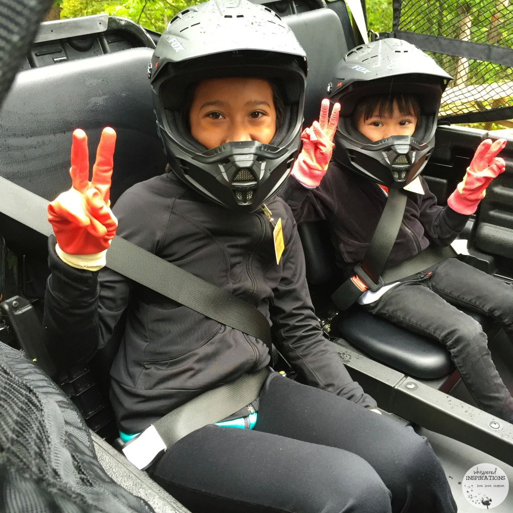 The girls all strapped into the Honda side-by-side.