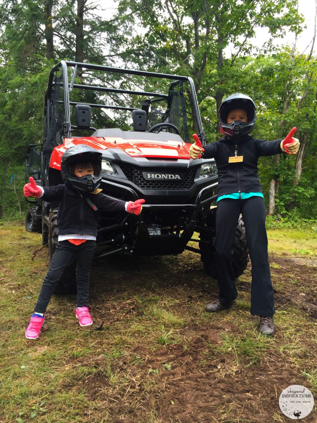 Gabby and Mimi posing in front of the side-by-side, they had a blast.