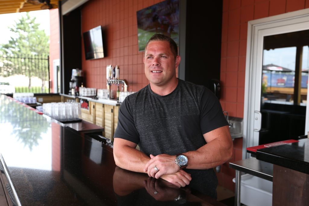 WINDSOR, ONTARIO - JULY 13, 2015 - Portrait of John O'Kane, owner of John Max Sports & Wings. Source: Windsor Star