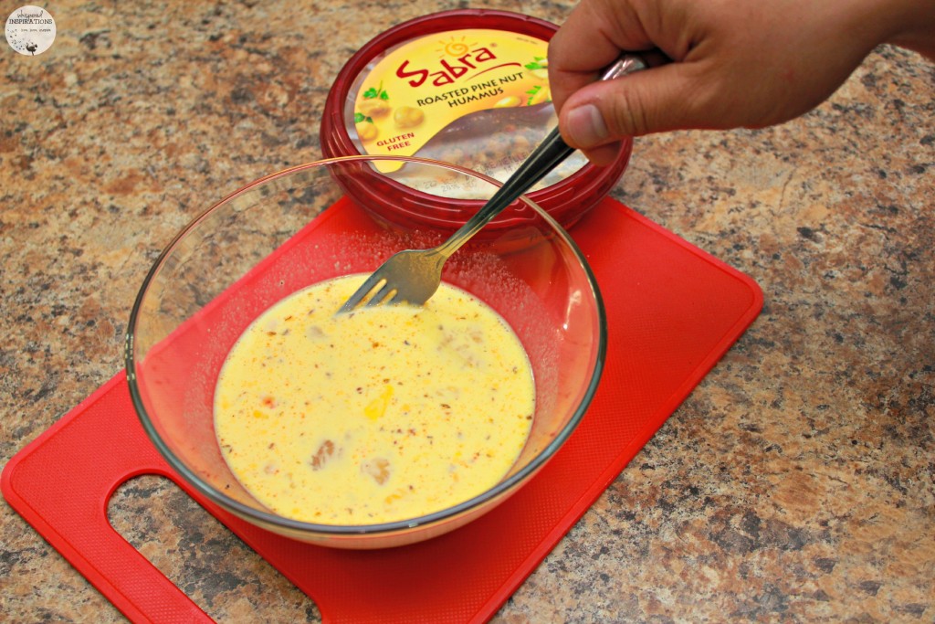 Sabra being mixed and blended completely into egg mixture. 