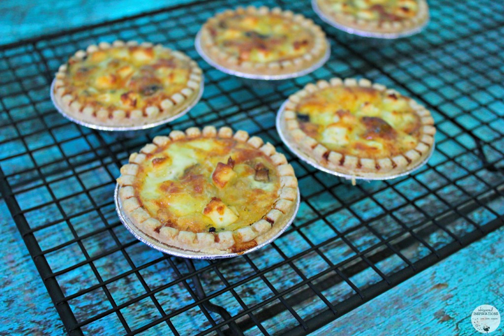 Mini Quiches cool on baking sheet. 