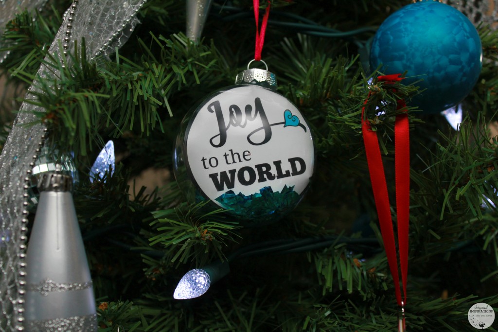 DIY Joy to the World ornament added to the tree. 