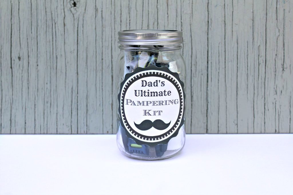 A mason jar with a pampering kit inside a mason jar with a DIY free printable label.