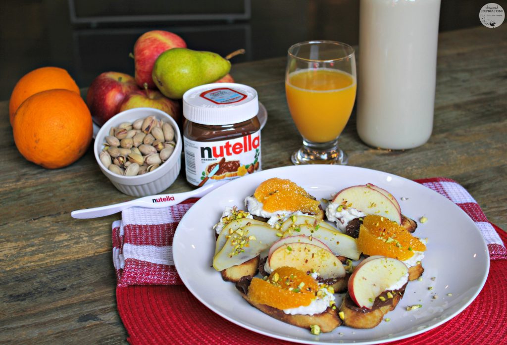 Crostini with Nutella, apples, and oranges. 