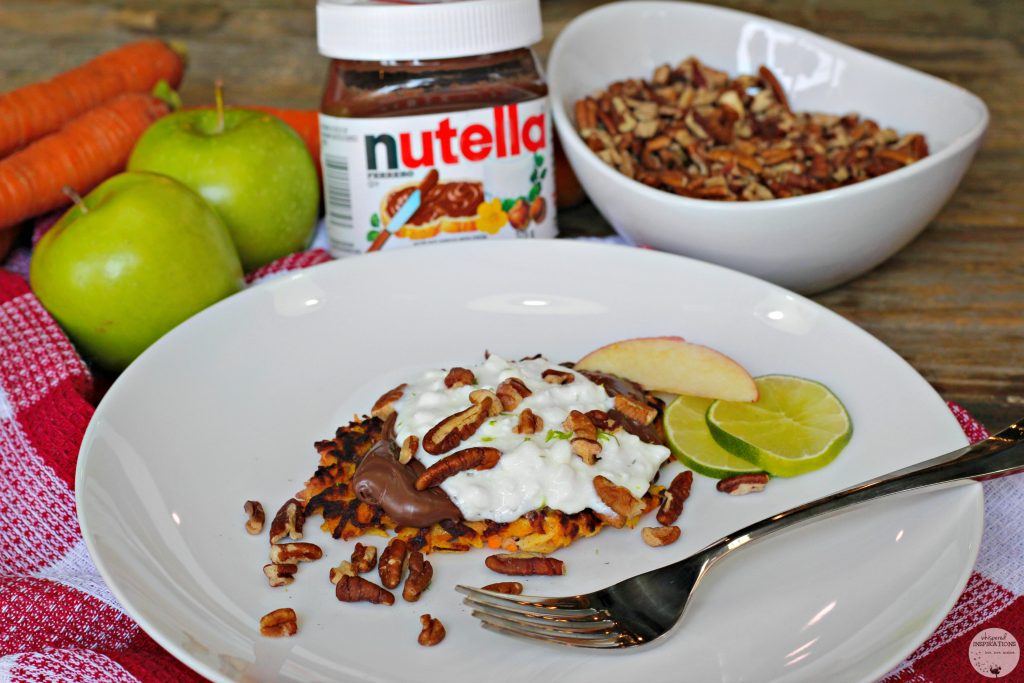 Carrot latkes topped with cottage cheese, pecans, lime and apples. 