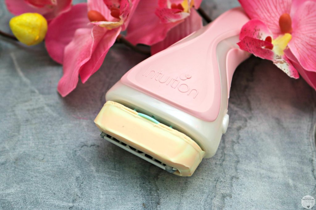 Schick Intuition pink razor with flowers. 