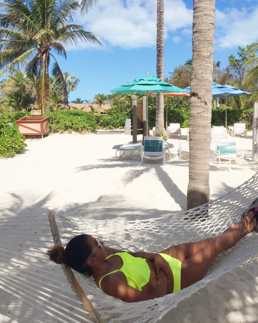 Gabby laying in a hammock in the Bahamas. 