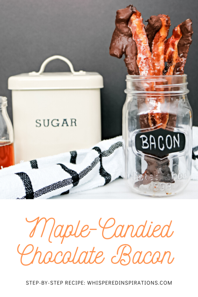 A mason jar holds chocolate-covered bacon and sugar and maple syrup and a striped napkin are shown. A banner reads, "Maple Candied Chocolate Bacon."