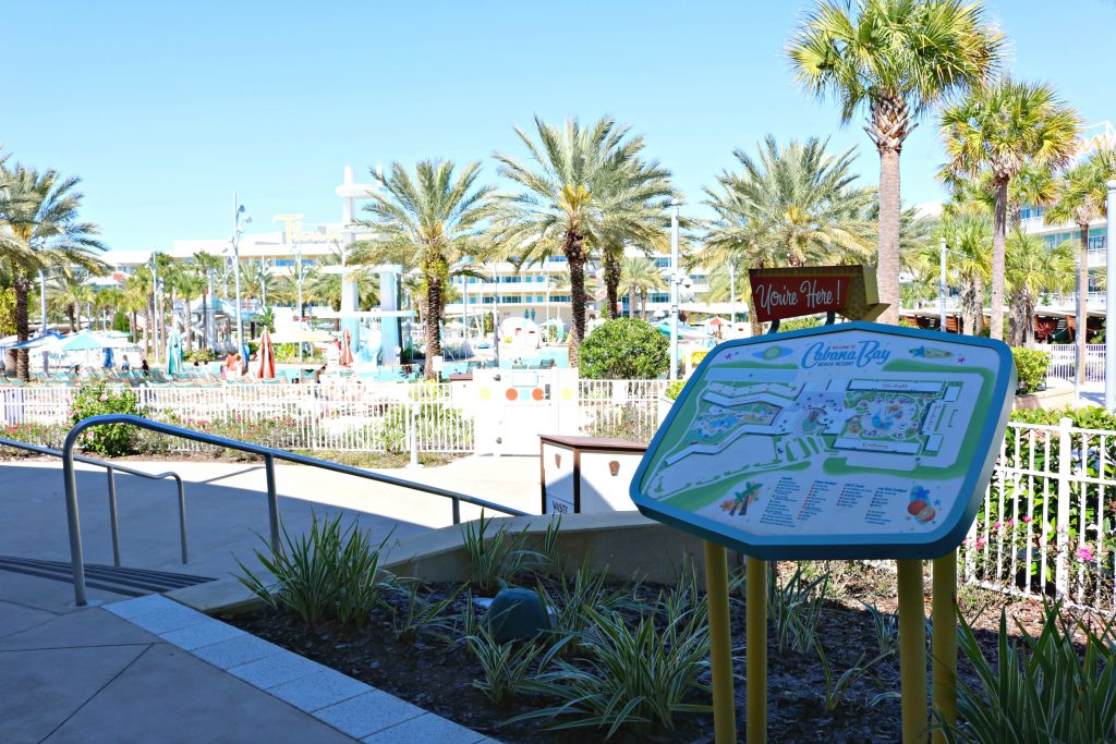 The pool area, palm trees, and sunshine. 