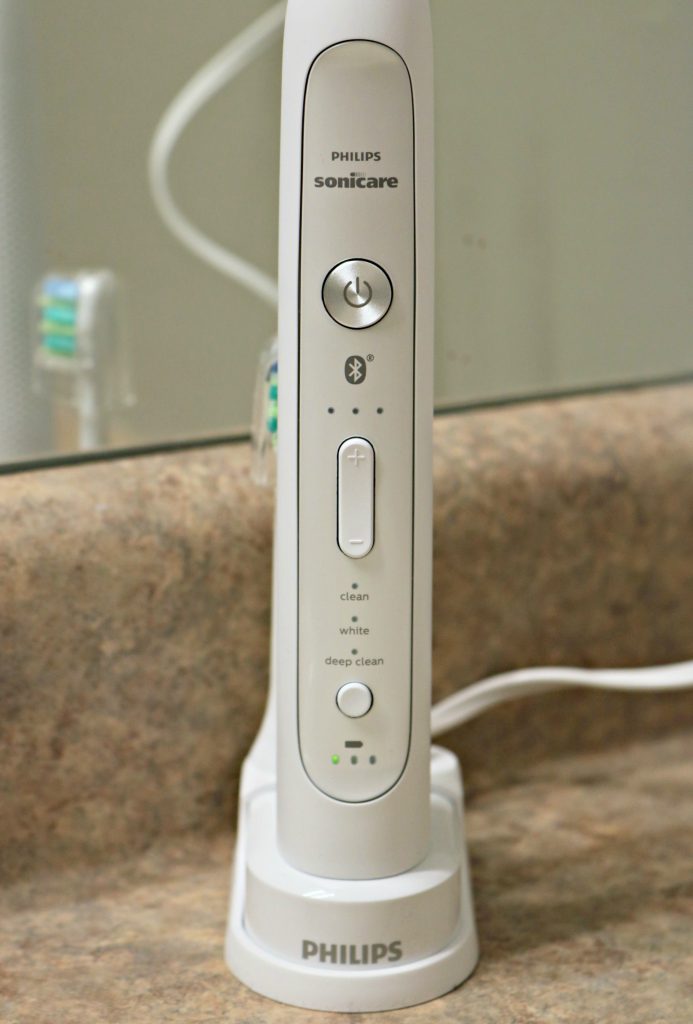 A close up of the Sonicare Toothbrush and it's controls and buttons.