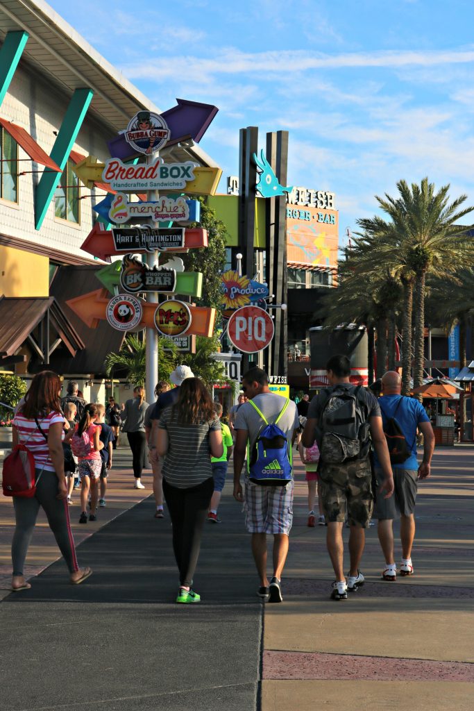 A group of kids walking through CityWalk.