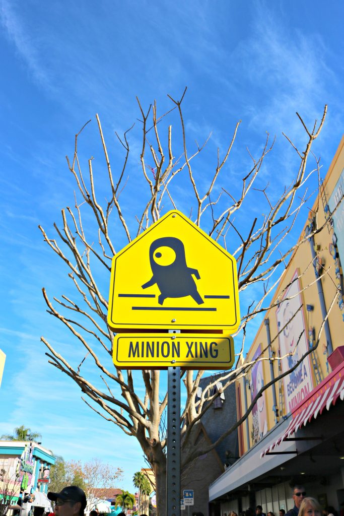 A yellow sign that reads Minion X-ing.