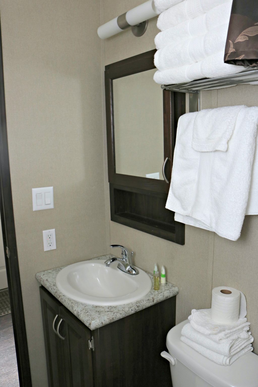 A view of the washroom and sink.