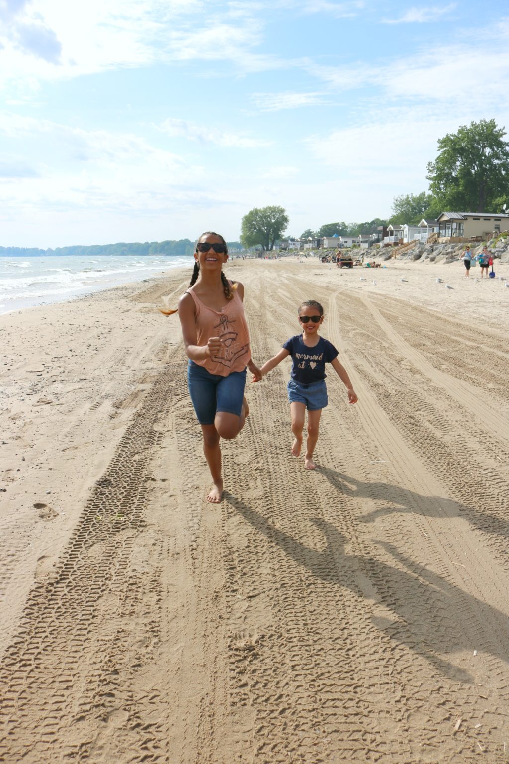 Mimi and Gabby running on the beach.