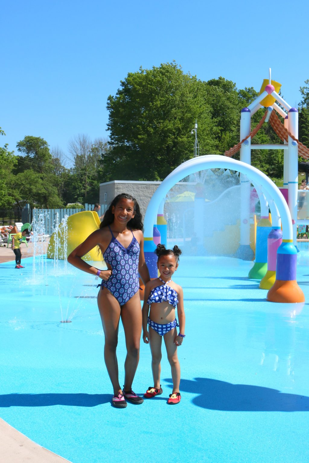 Mimi and Gabby pose in front of the water park at Sherkston Shores. 
