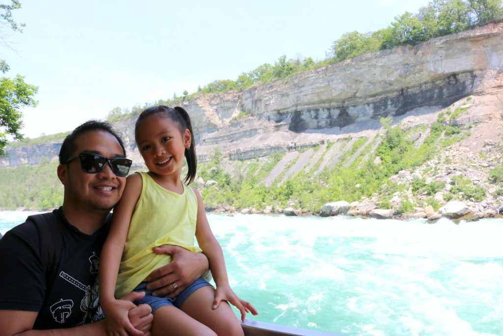 Mimi and Darasak pose in front of the Niagara Falls rapids.