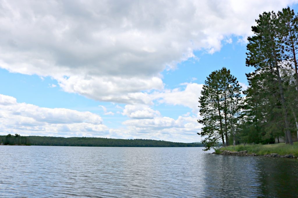 The view of the lake from inside a canoe. 