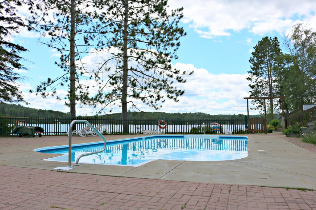 The outside pool at the Couples Resort is surrounded by the lake. 