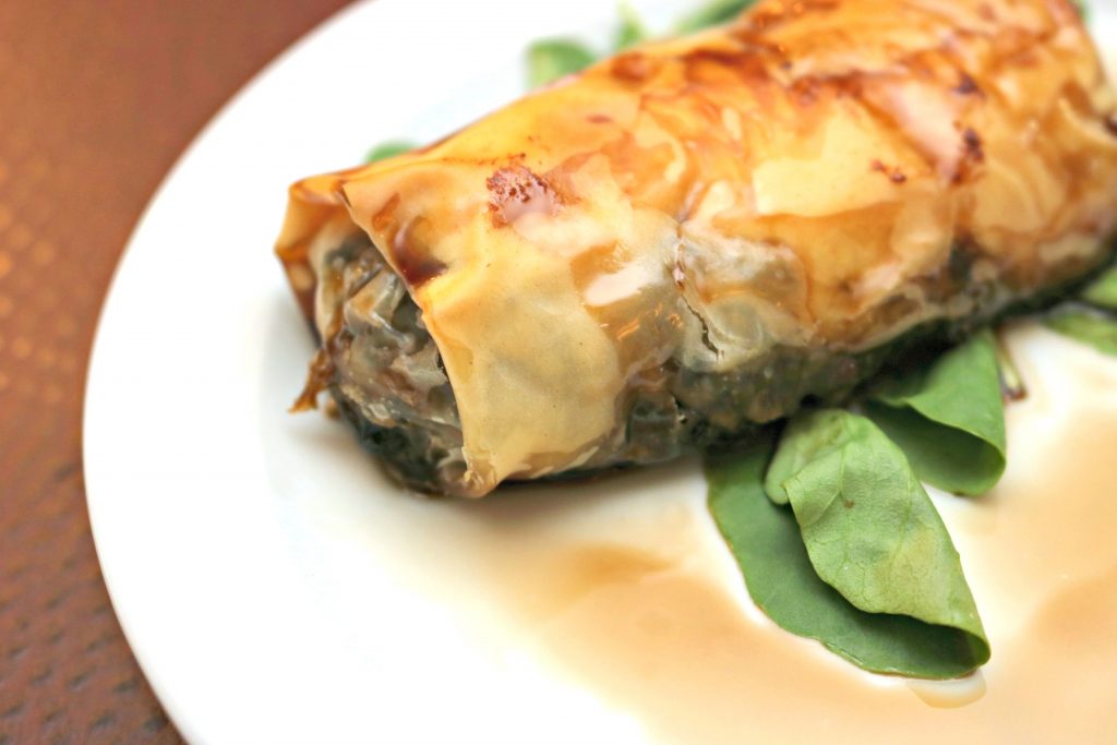 A phyllo wrapped appetizer stuffed with delicious quinoa. 