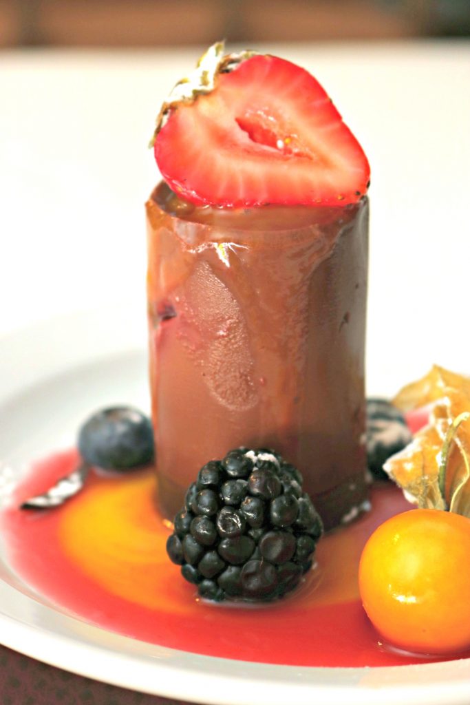 A delicious chocolate mousse with berry compote. 