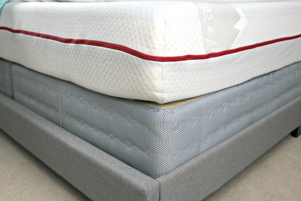 A lower view of the Douglas Mattress from GoodMorning.com. The mattress, box spring, and frame are pictured.