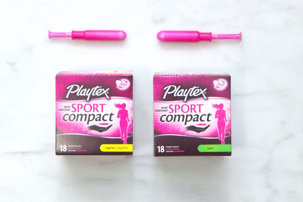 Two boxes of Playtex Sport Compact. 