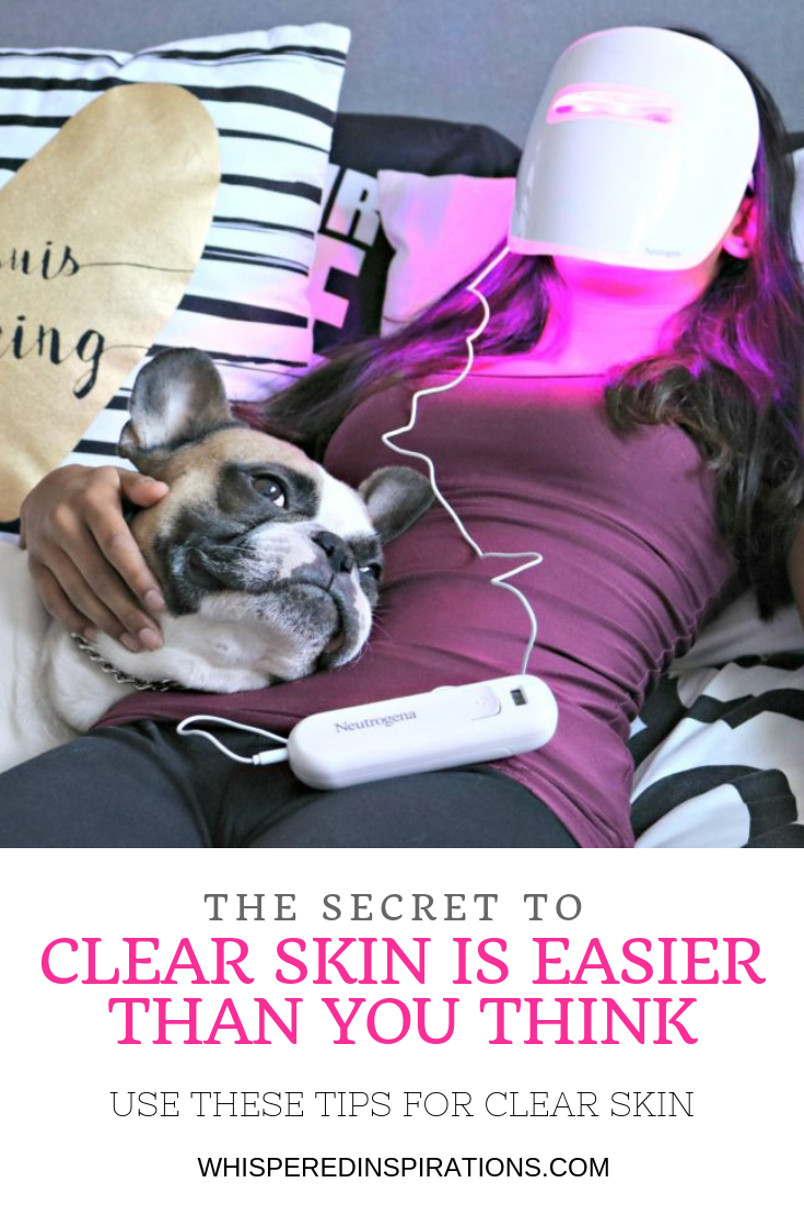 A picture of Gabby with Maverick the French Bulldog in bed, while Gabby uses the Neutrogena Acne Light Mask. A banner reads, 'the secret to clear skin is easier than you think, use these tips for clear skin."