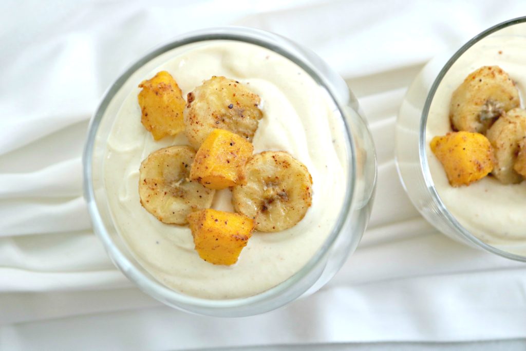 Close up of mango banana cheesecake cup.