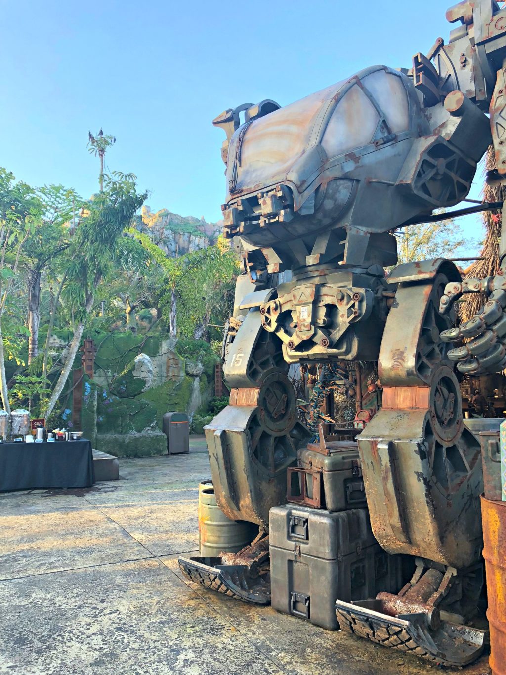 A robot from Avatar sits in Pandora at Animal Kingdom.