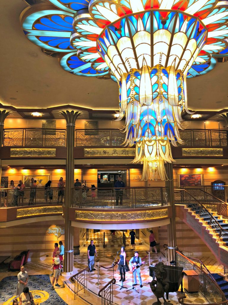 The inside of the Disney Dream with jazz singers on the stage.