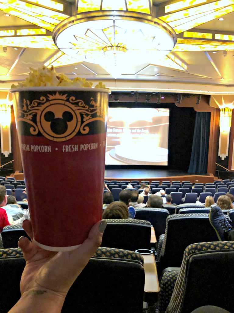 A cup of popcorn in the Disney Dream theatre.