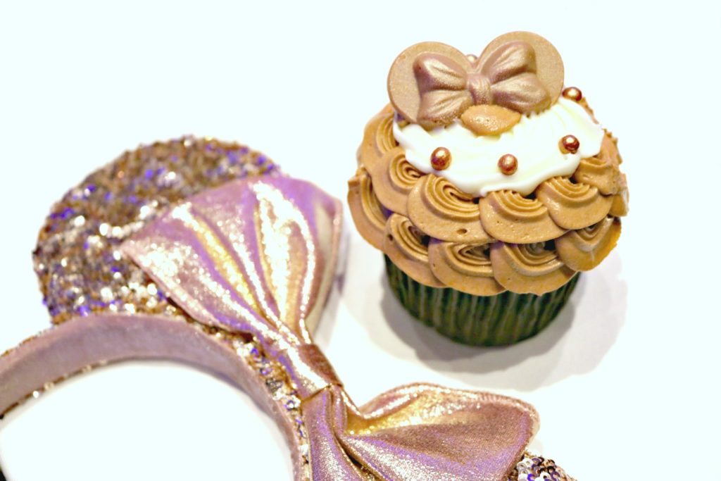Rose gold cupcake with rose gold Minnie ears.