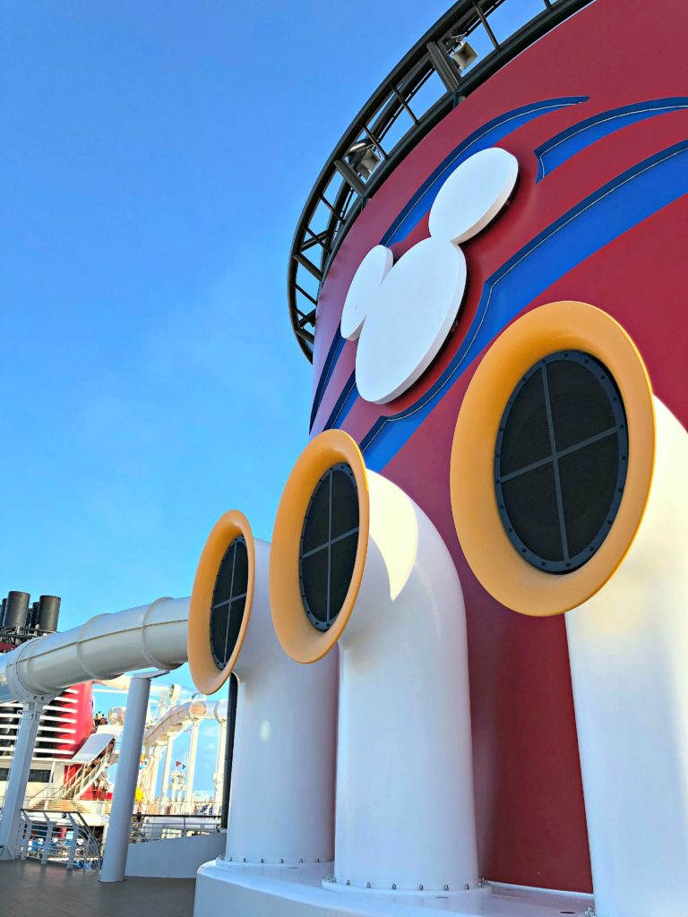 The smokestack next to the Aquaduck slide that wraps around the whole ship.